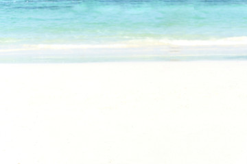 Fototapeta na wymiar tropical beach with bokeh sun light wave abstract background