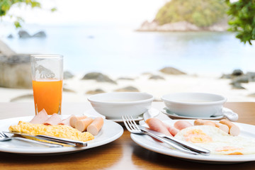 Enjoying Breakfast near tropical sea summer concept