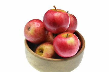 apples in a bowl isolated on white background