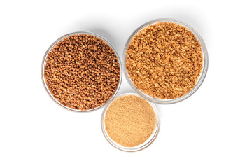 Buckwheat, flakes and flour isolated on white background.