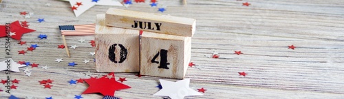 Wooden calendar with the date of July 4, happy independence day, patriotism and memory of veterans