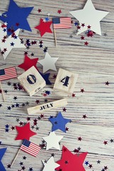 Wooden calendar with the date of July 4, happy independence day, patriotism and memory of veterans
