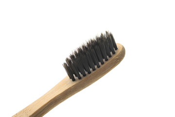 One natural organic reusable bamboo toothbrush  isolated on white. Concept zero waste. Clothe-up.