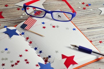 Diary with glasses open on the date of July 4, happy independence day, patriotism and memory of veterans 