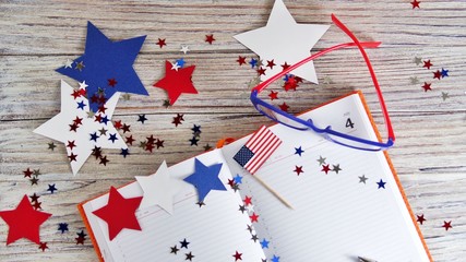 Diary with glasses open on the date of July 4, happy independence day, patriotism and memory of veterans 