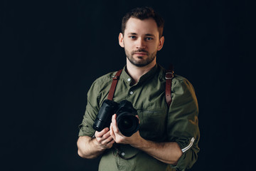 pleasant gorgeous professional photographer using a digital camera, close up photo, lifestyle , entertainment, hobby