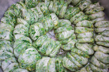 Fototapeta na wymiar Steamed dumpling stuffed with garlic chives, Kanom Kuicheai.