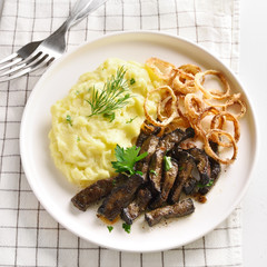 Beef liver with mashed potatoes and onion