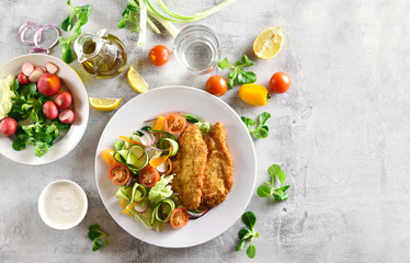Vegetable salad and schnitzel