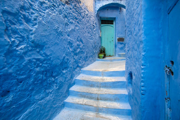 Street with blue walls in Chefchaouen in Morocco