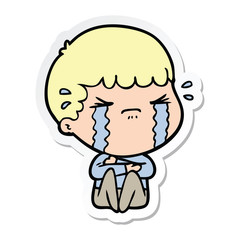 sticker of a cartoon man crying