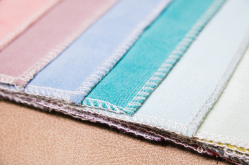 A set of samples of fabric furniture decoration lines of textile textures. Multicolored stripes upholstery. Mode and tone for a luxurious interior style. Abstract background