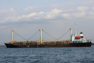 SHIP CARRYING WOOD