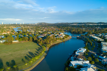 Aerial view of Reedy creek and luxury houses. Varsity Lakes, Gold Coast, Queensland, Australia