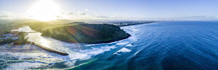 Wide aerial panorama of Gold Coast coastline at sunset.