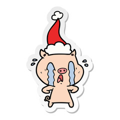 crying pig sticker cartoon of a wearing santa hat