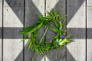 Stockholm, Sweden A midsummer wreath at a midsummer celebration lays on the floor.