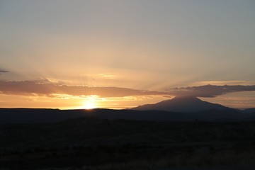 View of ancient Nevsehir cave town and a castle of Uchisar dug from a mountains in Cappadocia, Central Anatolia,Turkey
