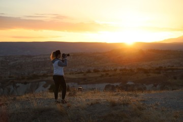 View of ancient Nevsehir cave town and a castle of Uchisar dug from a mountains in Cappadocia, Central Anatolia,Turkey