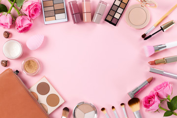 Obraz na płótnie Canvas Makeup products on a pink background