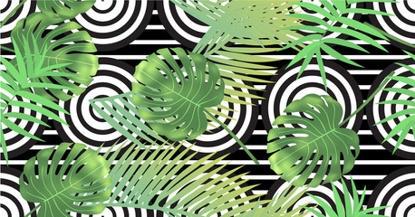 Beautiful tropical abstract color and green palm leaves seamless vector pattern on a background of geometric diagonal black and white lines