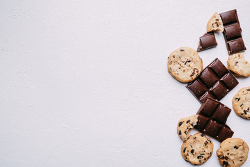 chocolate and cookie background, confectionery design concept. sweets on white table. sweet food, dessert backdrop with copy space