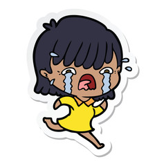 sticker of a cartoon girl crying