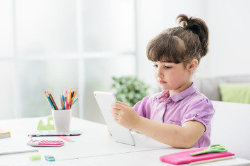 Child using a digital tablet