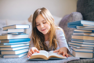 Little girl reading book