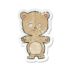 Naklejka premium retro distressed sticker of a cartoon happy teddy bear