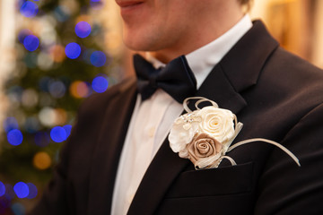 Wedding boutonniere on suit of the groom