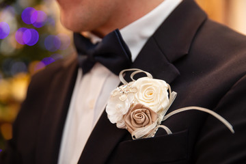 Wedding boutonniere on suit of the groom