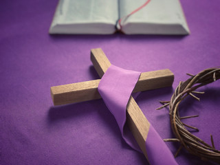 Good Friday, Lent Season and Holy Week concept - A religious cross, a bible and a woven crown of...