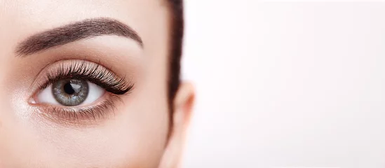 Foto op Aluminium Female Eye with Extreme Long False Eyelashes. Eyelash Extensions. Makeup, Cosmetics, Beauty. Close up, Macro © Oleg Gekman