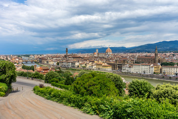 Fototapeta na wymiar Panaromic view of Florence with Basilica Santa Croce, Palazzo Vecchio, Ponte vecchio and Duomo viewed from Piazzale Michelangelo (Michelangelo Square)