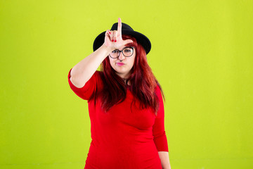 You are outsider. Studio shot of annoyed good-looking woman, feeling cool and confident while...