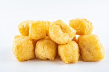 Golden oil tofu on white background