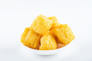 Golden oil tofu on white background