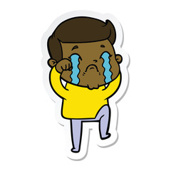 sticker of a cartoon man crying
