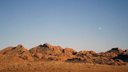 lonely moon on Gobi desert's sky
