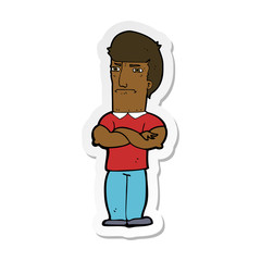 sticker of a cartoon annoyed man with folded arms