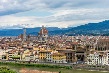 Fototapeta na wymiar Panaromic view of Florence townscape cityscape viewed from Piazzale Michelangelo (Michelangelo Square) with magnificent Renaissance dome designed by Filippo Brunelleschi