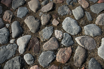 Round cubic stone road close up