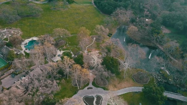 Aerial view of drone flying around Michael Jackson's former house. Neverland Ranch in the hills of Santa Barbara County
