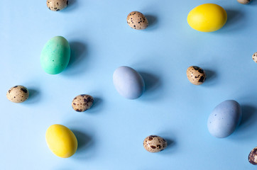 Lots of colorful and different sized Easter eggs.