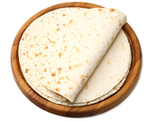 Tortilla wrap on wooden board isolated on white background