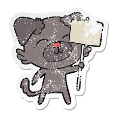 distressed sticker of a cartoon dog with protest sign