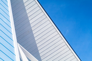 Fototapeta na wymiar Blue white wooden house facade