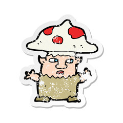 retro distressed sticker of a cartoon little mushroom man