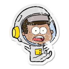 distressed sticker of a cartoon surprised astronaut